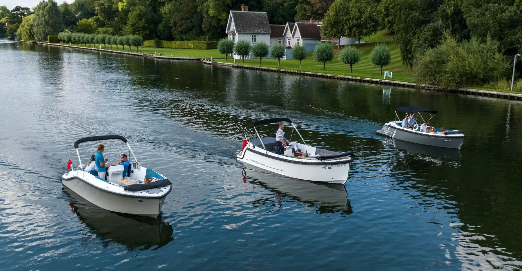 Corsiva 605 grey hull, blue cushions, Corsiva 650 white hull, Corsiva 595 grey hull